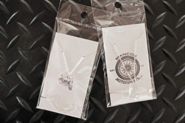 Little Silver Motorcycle Necklace in packaging
